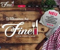 Startseite der Fine Local Food & Wine Foodtruck-Website mit rustikalem Design, Holzhintergrund und Informationen über hessisches Streetfood.